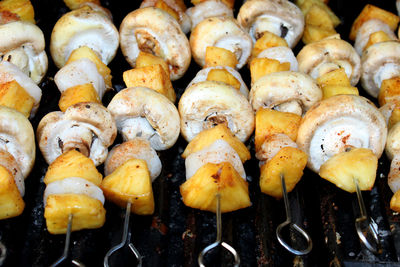 Close-up of meat on barbecue grill