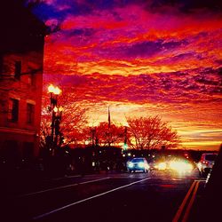 City street against cloudy sky