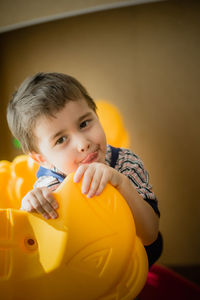 Portrait of cute boy at home