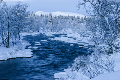 Small river at winter, dalarna, sweden