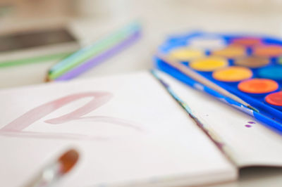 Close-up of colored pencils on table