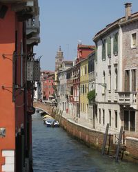 View of canal along buildings