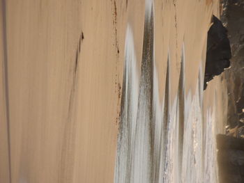 Close-up of sand at beach