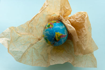 Globe in a kraft bag, recycling concept