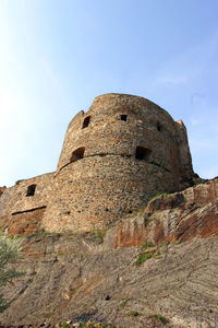 Low angle view of fort against the sky