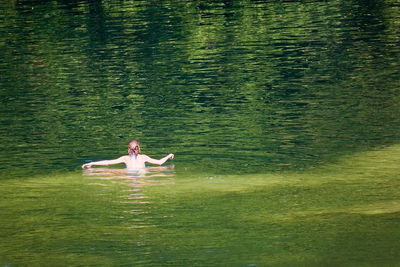 Swimming on the mreznica river, croatia