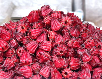 Close-up of red fruits for sale at market stall