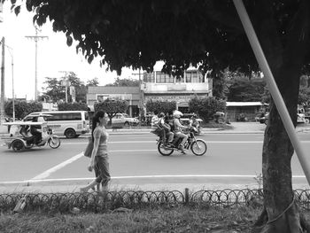 Man riding bicycle on street