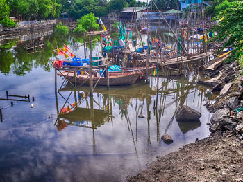 Boats moored in water