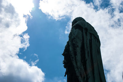 Low angle view of statue against sky