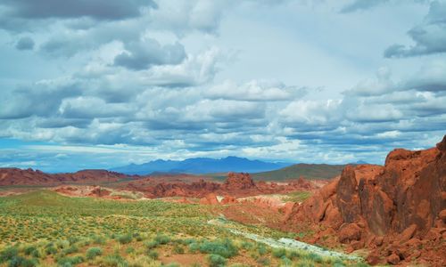 Panoramic view of landscape against cloudy sky