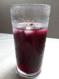 Close-up of beer glass on table