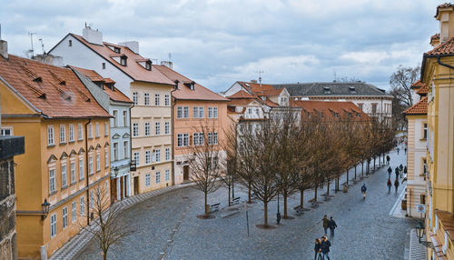 Buildings in city against sky