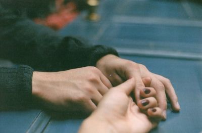 Cropped image of woman holding hands