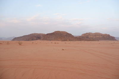 Scenic view of desert against sky