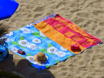 High angle view of towels on beach