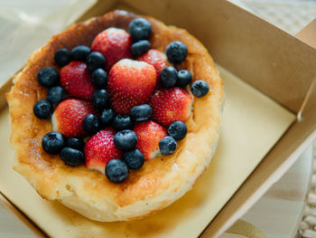 High angle view of strawberries in plate