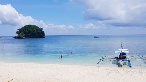 Scenic view of beach against sky