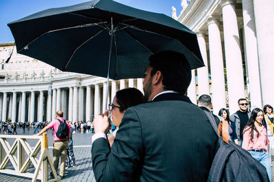 Group of people in front of building