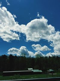 Scenic view of landscape against cloudy sky