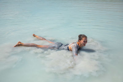 Man swimming in sea