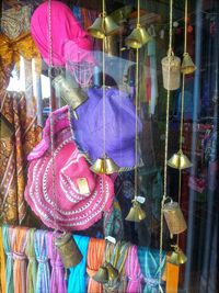 Multi colored objects hanging in store
