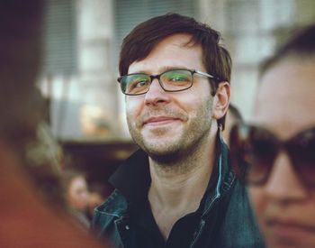 Portrait of smiling man wearing eyeglasses