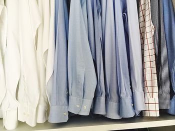 Close-up of shirts hanging in the closet 