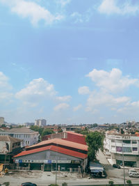 View of buildings in city against sky