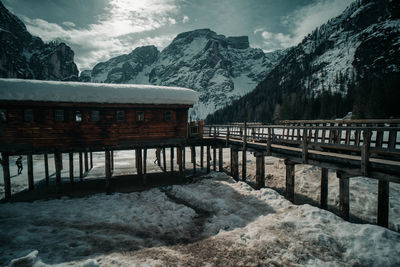 Scenic view of snowcapped mountains against sky during winter