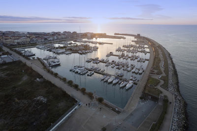 High angle view of city at sunset