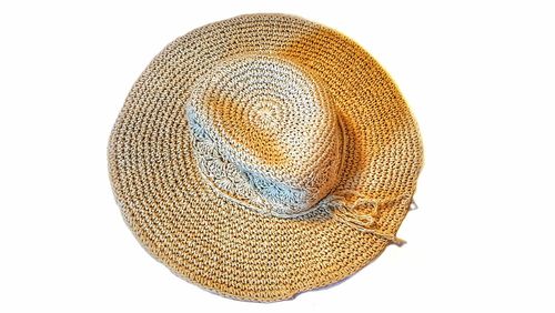 High angle view of hat against white background