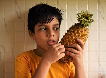 Portrait of boy holding ice cream