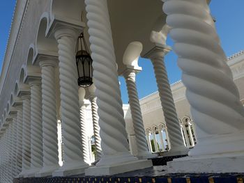 Low angle view of building against cloudy sky