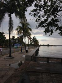 View of swimming pool at beach against sky