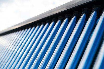 Low angle view of metallic structure against sky