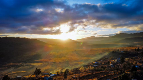 High angle view of village-scape against sky during sunrise. winter mornings in morija, lesotho.