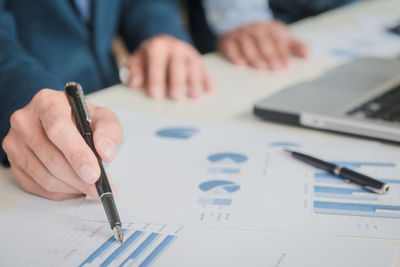 Close-up of man working in office