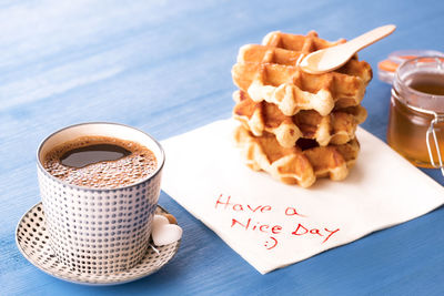 Close-up of coffee served on table