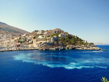 Scenic view of sea against clear blue sky