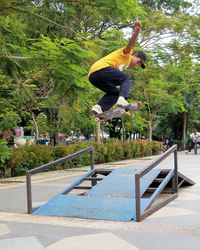 Man skateboarding on skateboard park