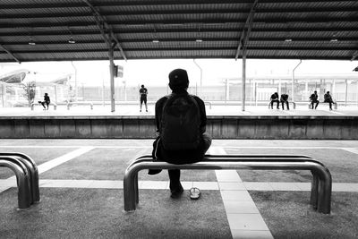 Silhouette of a man sitting