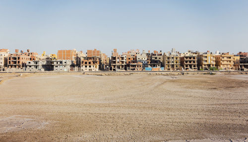 View of cityscape against clear sky