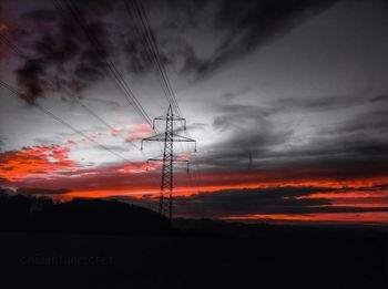 Scenic view of dramatic sky at sunset