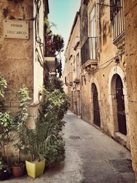 Narrow alley with buildings in background