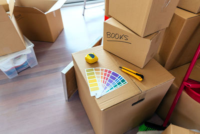 High angle view of color swatches on cardboard box at home