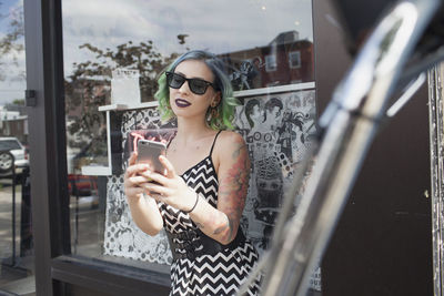 A young woman on her cell phone.