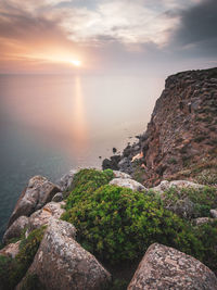 Scenic view of sea against sky during sunset