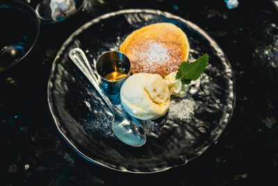 High angle view of ice cream in plate on table