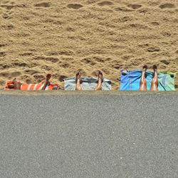 High angle view of deck chairs on beach